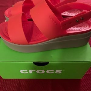 Comfortable  pretty red crocs that matches well with jeans and stretch pants.